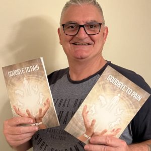 Tony Sherry with book