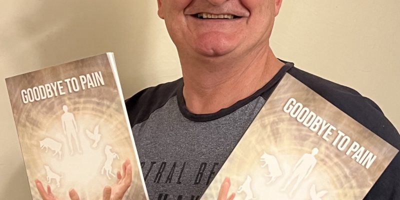 Tony Sherry with book